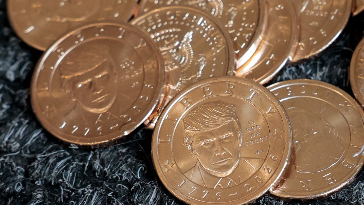 U.S. President Donald Trump's portrait on $1 coins, in honor of the nation's 250th anniversary of independence, on the day the coin is released for sale is seen in this illustration taken on Sept. 2, 2026. (Reuters Photo)