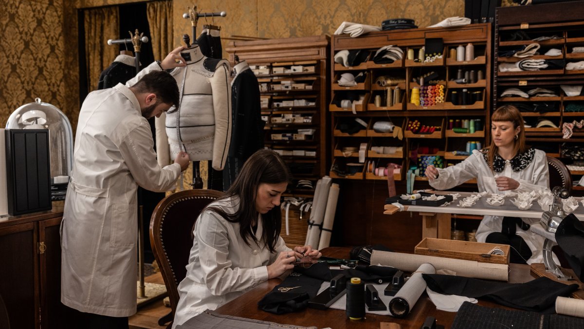 Tailors and seamstresses of the Italian fashion house Dolce and Gabbana work on haute couture outfits during the exhibition "From the Heart to the Hands: Dolce &amp; Gabbana," Milan, Italy, April 5, 2024. (Getty Images Photo)