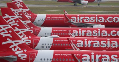 AirAsia planes wait on the tarmac at Kuala Lumpur International Airport Terminal 2 (KLIA2), Sepang, Malaysia, Jan. 21, 2026. (Reuters Photo)