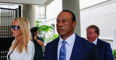 Golfer Tiger Woods (C), flanked by his girlfriend, Vanessa Trump, leaves the courthouse after his scheduled in-person appearance before a judge for the first time since his March 27 car accident, when he was arrested on a misdemeanor charge of driving under the influence (DUI) after a rollover crash, Stuart, U.S., Sept. 2, 2026. (Reuters Photo)