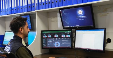 An Istanbul police officer works at a computer during a cybercrime investigation, Istanbul, Türkiye, Aug. 27, 2026. (AA Photo)