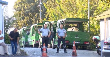 This undated photo shows police officers standing guard at the cemetery where Denizolgun is buried, Istanbul, Türkiye. (DHA Photo)