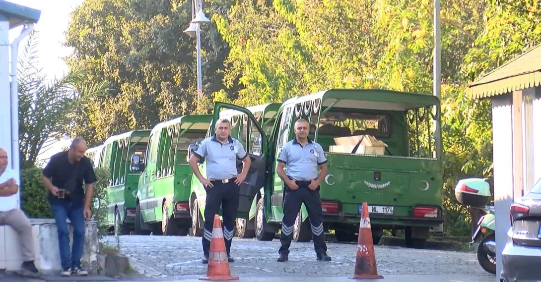 This undated photo shows police officers standing guard at the cemetery where Denizolgun is buried, Istanbul, Türkiye. (DHA Photo)
