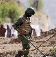 A mine clearing expert checks the terrain as the road leading from the city of Taiz, in the southwest of the country, to the Houthi-controlled capital Sanaa, June 13, 2024. (AFP File Photo)