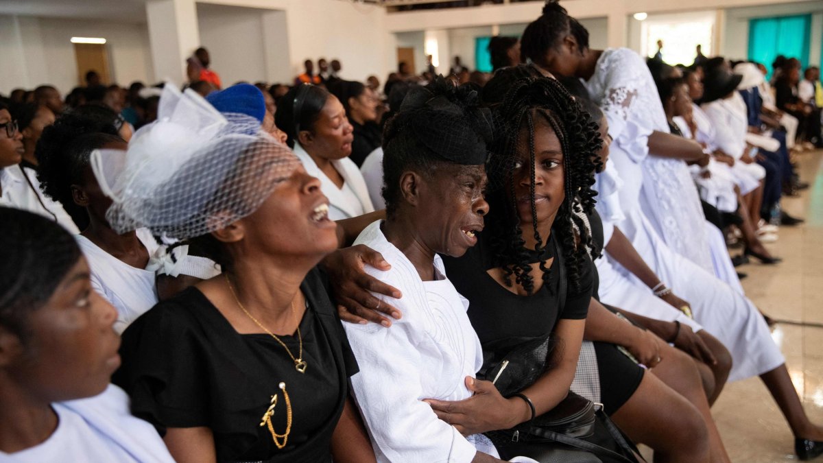 People mourn during a collective funeral service for more than twenty people killed by armed gangs last week in Kenscoff, Port-au-Prince, Haiti, Sept. 2, 2026. (AFP Photo)