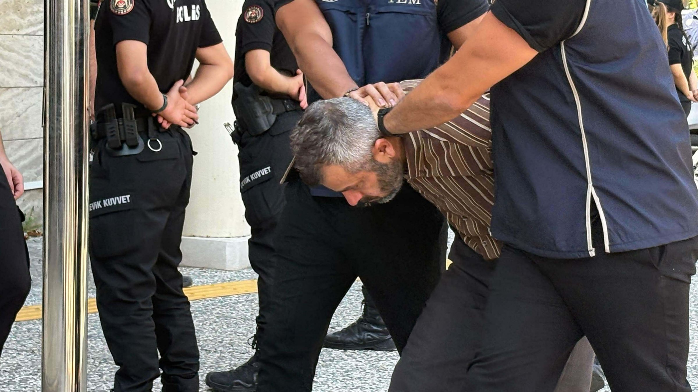 FETÖ fugitive Burkay Karatepe, wanted for his involvement in the assassination attempt targeting President Recep Tayyip Erdoğan during the July 15, 2016 coup attempt, is detained, Muğla, Türkiye, Aug. 8, 2026. (AA Photo)