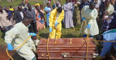 Health workers bury the coffin during the funeral ceremony for victims of the Ebola outbreak in Nyamurongo cemetery, Bunia, Ituri, DRC, Sept. 3, 2026. (EPA Photo)