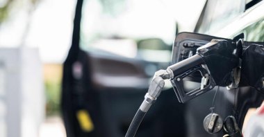 A gas pump is situated in a vehicle at a Chevron gas station in Austin, Texas, U.S., Aug. 7, 2026. (AFP Photo)