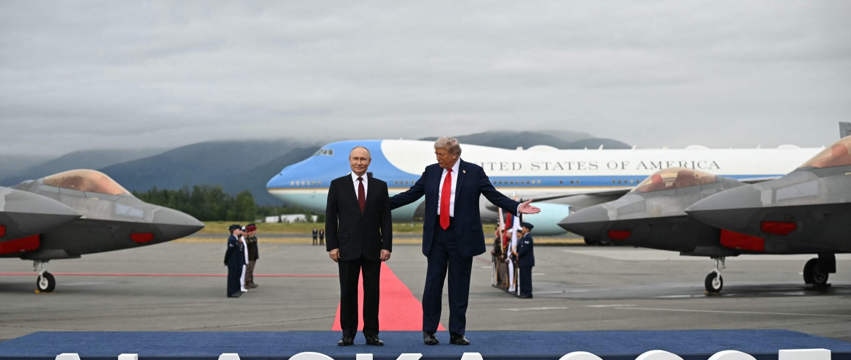U.S. President Donald Trump and Russian President Vladimir Putin pose on a podium on the tarmac after they arrived at Joint Base Elmendorf-Richardson in Anchorage, Alaska, Aug. 15, 2025. (AFP File Photo)