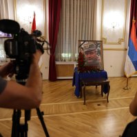 Photographers take photos of a portrait of former Bosnian Serb general Ratko Mladic during a commemoration held in his memory in Belgrade, Serbia, Sept. 5, 2026. (EPA Photo)