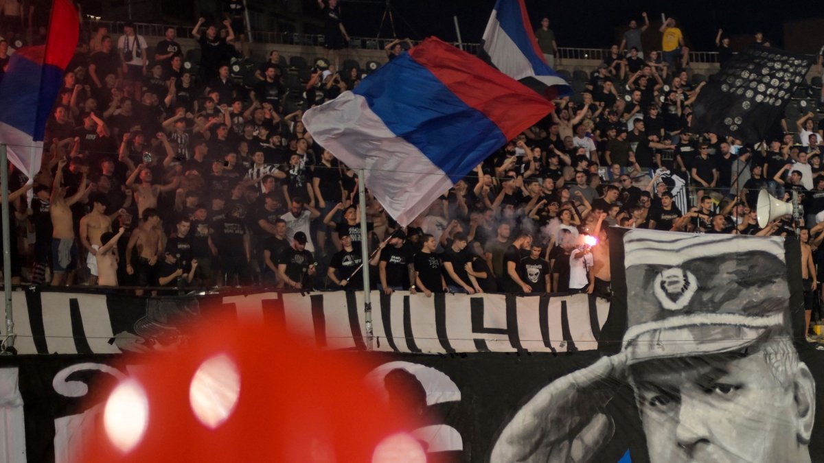 Partizan Belgrade supporters display a banner depicting former Bosnian Serb military chief Ratko Mladic during the Serbian Super Liga football match between Partizan Belgrade and OFK Beograd, Belgrade, Serbia, Aug. 31, 2026. (AFP Photo)