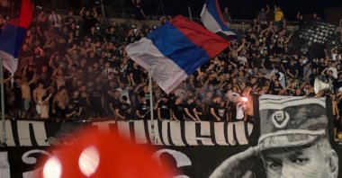 Partizan Belgrade supporters display a banner depicting former Bosnian Serb military chief Ratko Mladic during the Serbian Super Liga football match between Partizan Belgrade and OFK Beograd, Belgrade, Serbia, Aug. 31, 2026. (AFP Photo)