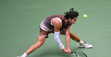 Spain's Carlos Alcaraz hits a return to China's Wu Yibing during their men's singles third-round tennis match on day six of the U.S. Open tennis tournament at the USTA Billie Jean King National Tennis Center, New York City, U.S., Sept. 4, 2026. (AFP Photo)