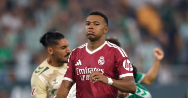 Real Madrid's Kylian Mbappe looks dejected after his penalty is saved by Real Betis' Alvaro Valles during the La Liga match at Estadio La Cartuja, Seville, Spain, Sept. 4, 2026. (Reuters Photo)