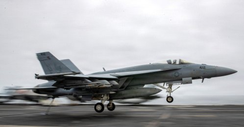 In this US Navy handout photo, an F/A-18 Super Hornet, attached to Strike Fighter Squadron (VFA) 195, lands on the flight deck of the Nimitz-class aircraft carrier USS George Washington (CVN 73), Aug. 27, 2026. (AFP Photo)