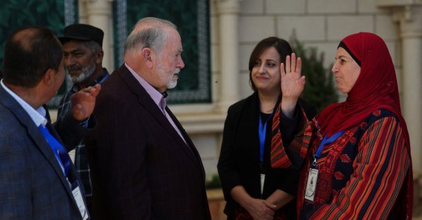U.S. Ambassador to Israel Mike Huckabee meets a resident of Turmus Ayya, a Palestinian town near Ramallah, West Bank, Palestine, Sept. 5, 2026. (Reuters Photo)