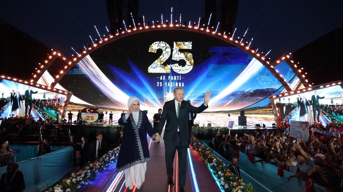 AK Party Chair and President Recep Tayyip Erdoğan and first lady Emine Erdoğan greet the crowd at an event for the  25th anniversary of the AK Party, Ankara, Türkiye, Aug. 14, 2026. (IHA Photo)