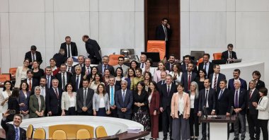 DEM Party lawmakers pose after a vote at Parliament, Ankara, Türkiye, Aug. 10, 2026. (AFP Photo)