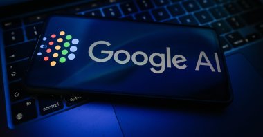 In this photo illustration, a Google AI logo is displayed on a smartphone on top of a laptop, Poland, May 11, 2026. (Getty Images Photo)