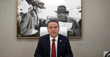 An undated photo shows former Mayor Muhittin Böcek in his office, Antalya, southern Türkiye. (DHA Photo)