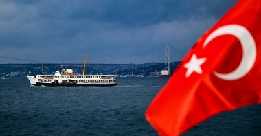 A Turkish flag is seen with a background of the July 15 Martyrs Bridge, Istanbul, Türkiye, Aug. 9, 2026. (AA Photo)