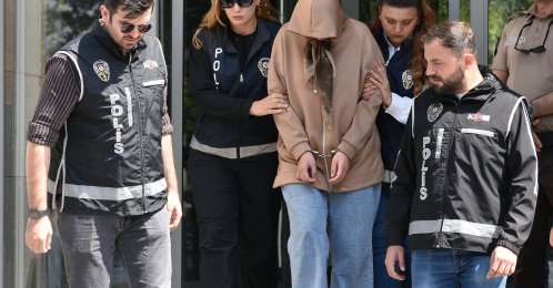 Police officers escort a suspect to prison following the latest developments in the Gülistan Doku investigation, Erzurum, Türkiye, Sept. 1, 2026. (AA Photo)