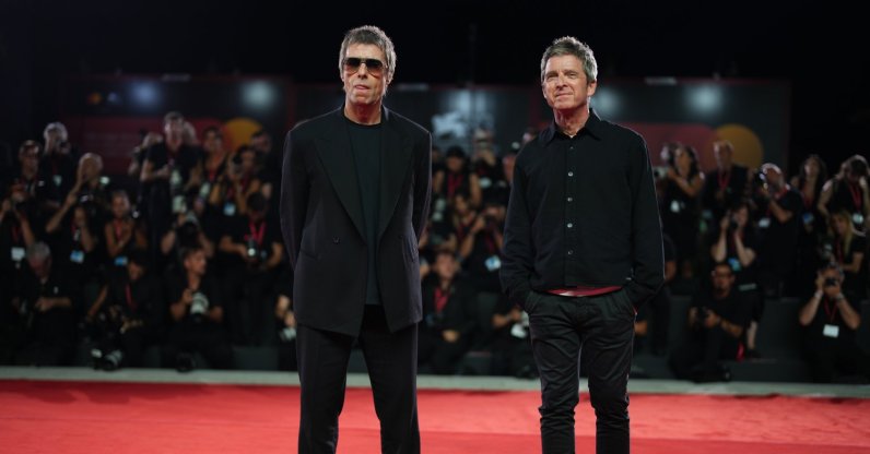 Liam (L) and Noel Gallagher pose for photographers on the red carpet for the film "Oasis: Don't Look Back In Anger" at the 83rd edition of the Venice Film Festival, Venice, Italy, Sept. 5, 2026. (AP Photo)