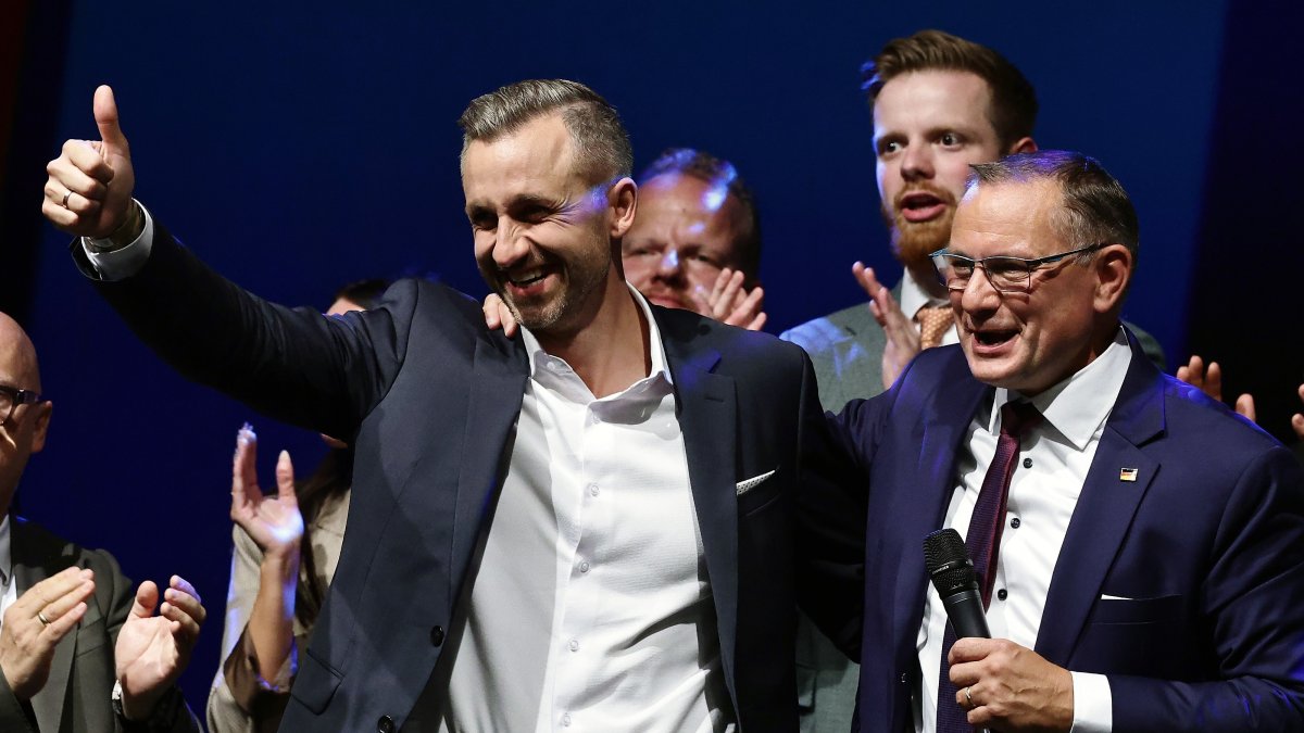 Top candidate Ulrich Siegmund (L) and party and parliamentary group co-chairman Tino Chrupalla gesture during a far-right Alternative for Germany (AfD) election party following the Saxony-Anhalt state election, Magdeburg, Germany, Sept. 6, 2026. (EPA Photo)