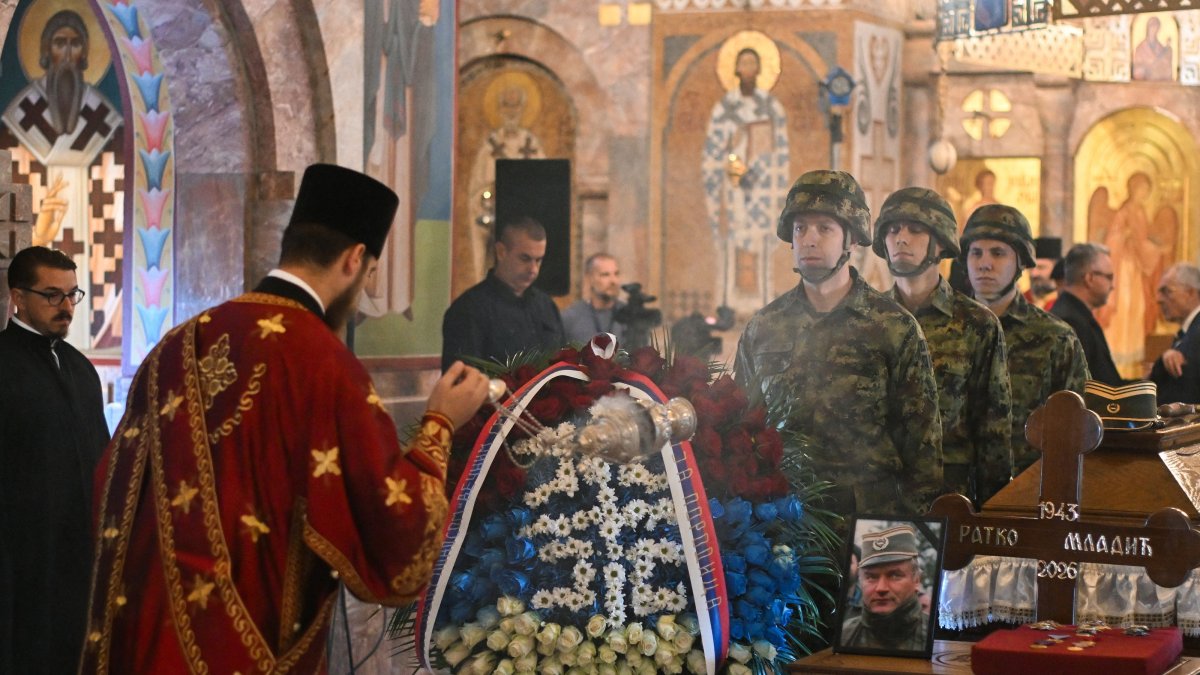 An Orthodox priest blesses the coffin of the late Bosnian Serb military leader Ratko Mladic during a public memorial on the day of his funeral ceremony at St Lukas church, Belgrade, Serbia, Sept. 7, 2026. (AFP Photo)