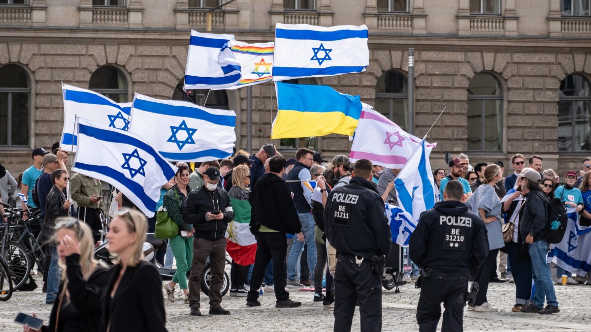 People carry Israeli flags during a "stop-the-left" demonstration, Berlin, Germany, Sept. 5, 2026. (Getty Images Photo)