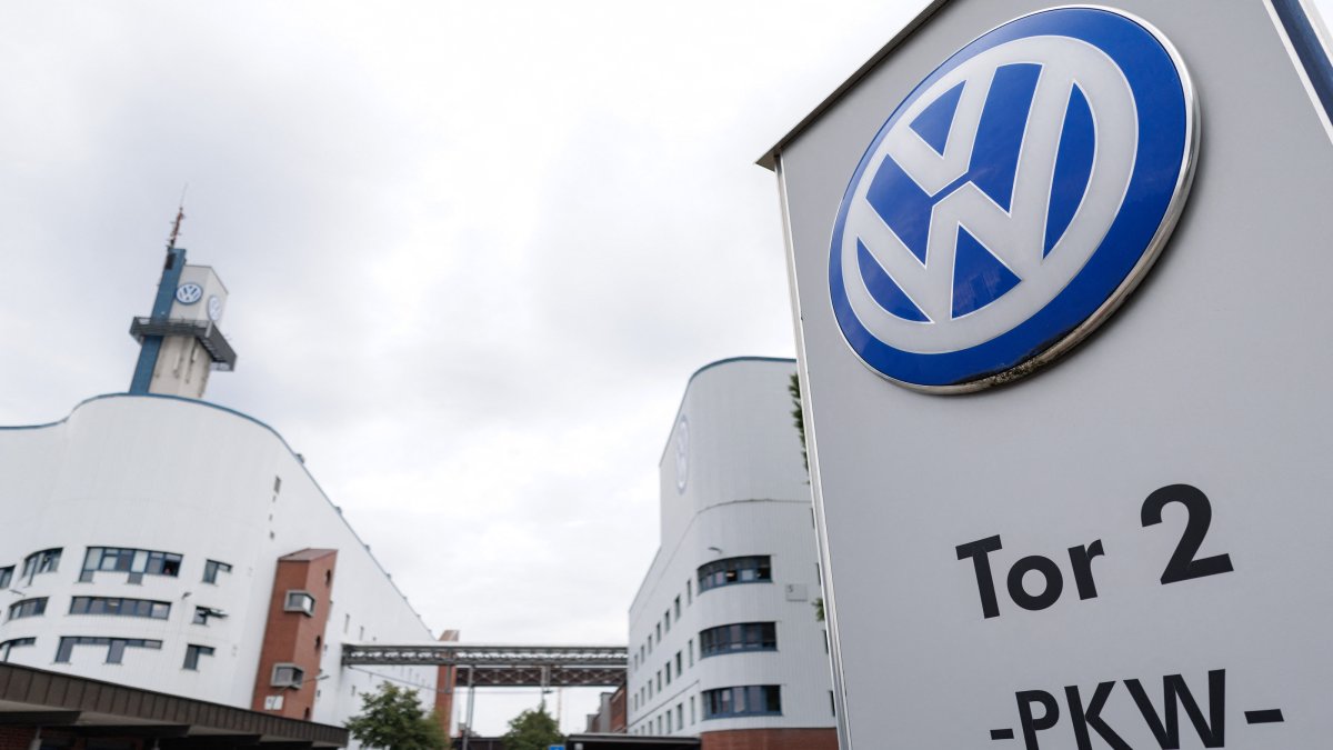 The VW logo in front of the Volkswagen plant, Osnabrueck, Germany, Aug. 26, 2026. (AP Photo)