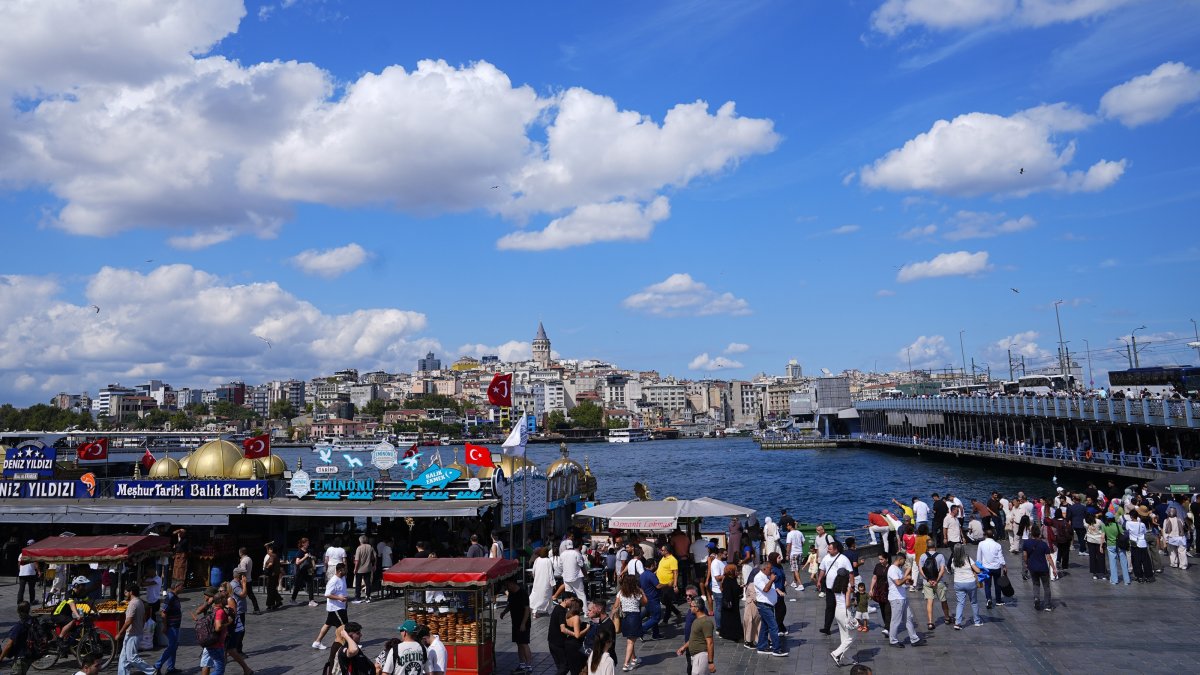 People walk in the historic district of Eminönü in Istanbul, Türkiye, Aug. 16, 2026. (AA Photo)
