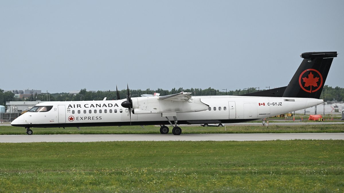 A Bombardier Q-400 Air Canada Express plane lands at Trudeau International Airport in Montreal, Quebec, Canada, Sunday, Aug. 16, 2026. (AFP File Photo)