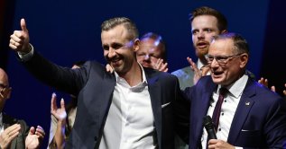 Top candidate Ulrich Siegmund (L) and party and parliamentary group co-chairman Tino Chrupalla gesture during a far-right Alternative for Germany (AfD) election party following the Saxony-Anhalt state election, Magdeburg, Germany, Sept. 6, 2026. (EPA Photo)