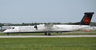 A Bombardier Q-400 Air Canada Express plane lands at Trudeau International Airport in Montreal, Quebec, Canada, Sunday, Aug. 16, 2026. (AFP File Photo)