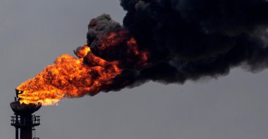 A view of a chimney at an oil refining plant of state-owned Petroleos de Venezuela (PDVSA), Puerto La Cruz, Anzoategui state, Venezuela, Nov. 4, 2021. (AFP Photo)