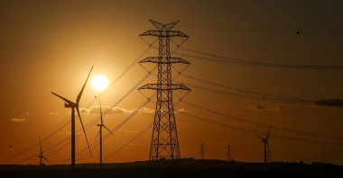 The sun sets behind wind turbines, Silivri, near Istanbul, Türkiye, Aug. 16, 2025. (Reuters Photo)