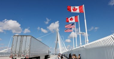 A truck crosses into the United States on the Gordie Howe International Bridge, connecting Windsor, Ontario, and Detroit, Michigan, Sept. 6, 2025.  (AFP Photo)