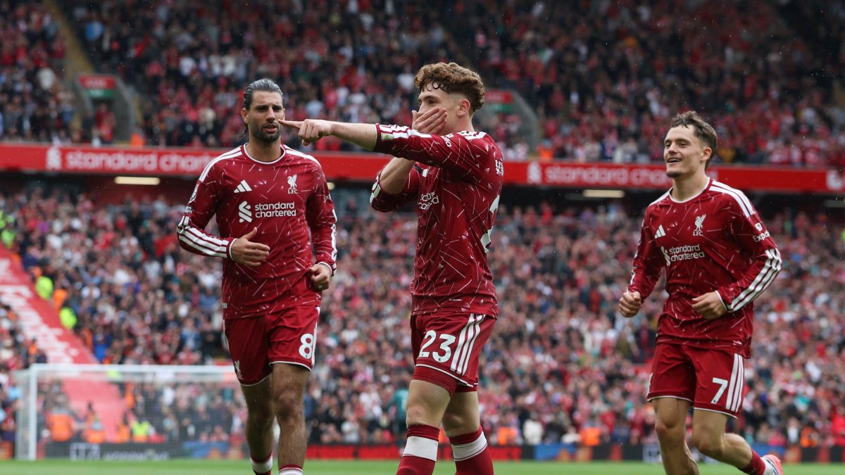 Liverpool's Victor Munoz celebrates scoring their second goal with Dominik Szoboszlai and Florian Wirtz during the Premier League match between Liverpool and Nottingham Forest at Anfield Stadium, Liverpool, Britain, Aug. 29, 2026. (Reuters Photo)