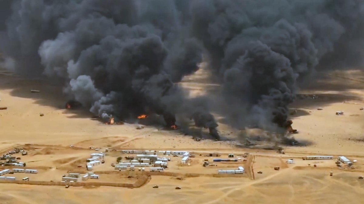 Smoke and fire rise from trucks at a camp of the Saudi-backed government forces following a Houthi missile strike, in the eastern province of Hadramout, Yemen, Sept. 7, 2026. (EPA Photo)