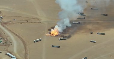 Smoke and fire rise from trucks at a camp of the Saudi-backed government forces following an alleged Houthi missile strike, in the eastern province of Hadramout, Yemen, Sept. 7, 2026. (EPA Photo)