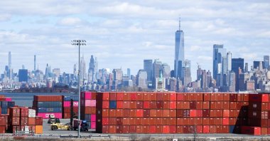 Shipping containers are seen at the Port Jersey Container Terminal, with the Manhattan skyline in the distance, in Jersey City, New Jersey, U.S., April 8, 2025. (AFP Photo)