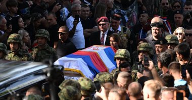 A large crowd of mourners gathers for a funeral procession for late convicted war criminal Ratko Mladic, in Belgrade, Serbia, Sept. 7, 2026. (AFP Photo)