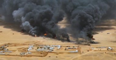 Smoke and fire rise from trucks at a camp of the Saudi-backed government forces following a Houthi missile strike, in the eastern province of Hadramout, Yemen, Sept. 7, 2026. (EPA Photo)