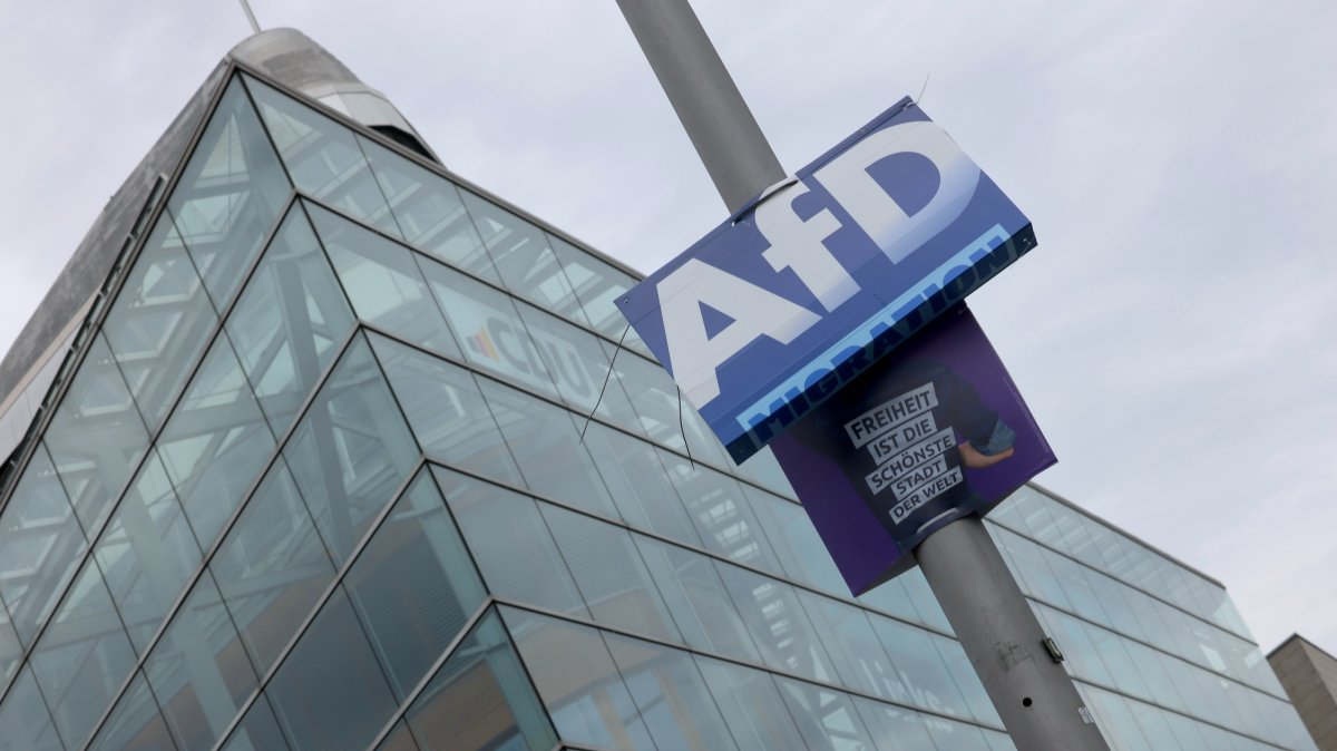 A far-right Alternative for Germany (AfD) party election campaign poster on display in front of the Christian Democratic Union (CDU) headquarters in Berlin, Germany, Sept. 7, 2026. (EPA Photo)