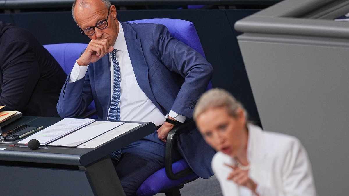 German Chancellor Friedrich Merz (L) looks on as AfD leader Alice Weidel opens a general debate in the Bundestag, in Berlin, Sept. 9, 2026 (AP Photo)