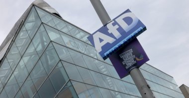 A far-right Alternative for Germany (AfD) party election campaign poster on display in front of the Christian Democratic Union (CDU) headquarters in Berlin, Germany, Sept. 7, 2026. (EPA Photo)