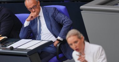 German Chancellor Friedrich Merz (L) looks on as AfD leader Alice Weidel opens a general debate in the Bundestag, in Berlin, Sept. 9, 2026 (AP Photo)