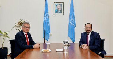 TRNC President Tufan Erhürman (L) meets with Greek Cypriot head Nikos Christodoulides (R), Lefkoşa (Nicosia), U.N.-controlled buffer zone, Sept. 9, 2026. (AA Photo)
