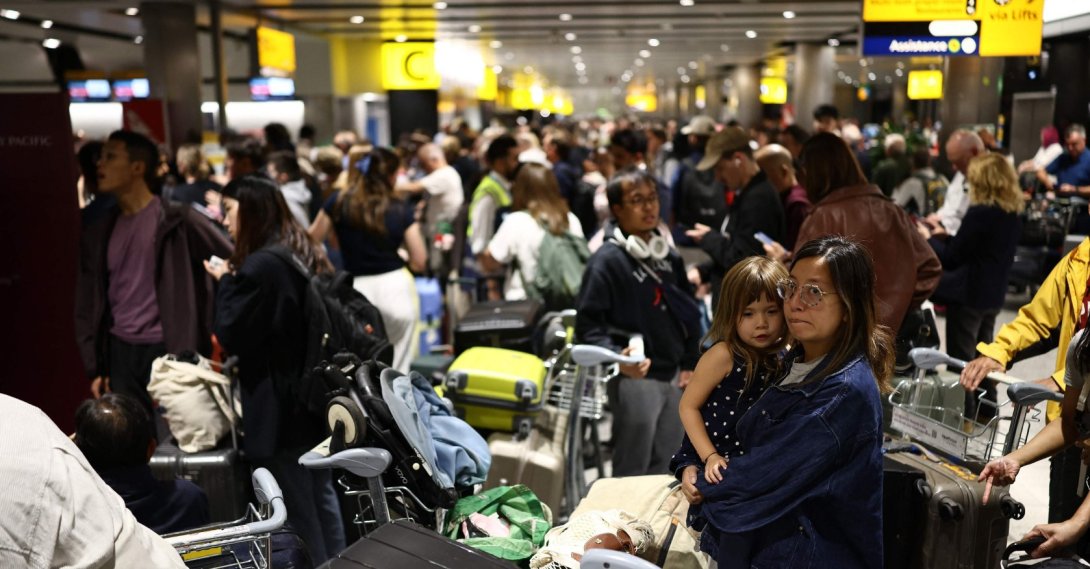 Delayed passengers wait and queue with their luggage at Terminal 3 of London Heathrow Airport, west of London, Britain, Sept. 8, 2026. (AFP Photo)
